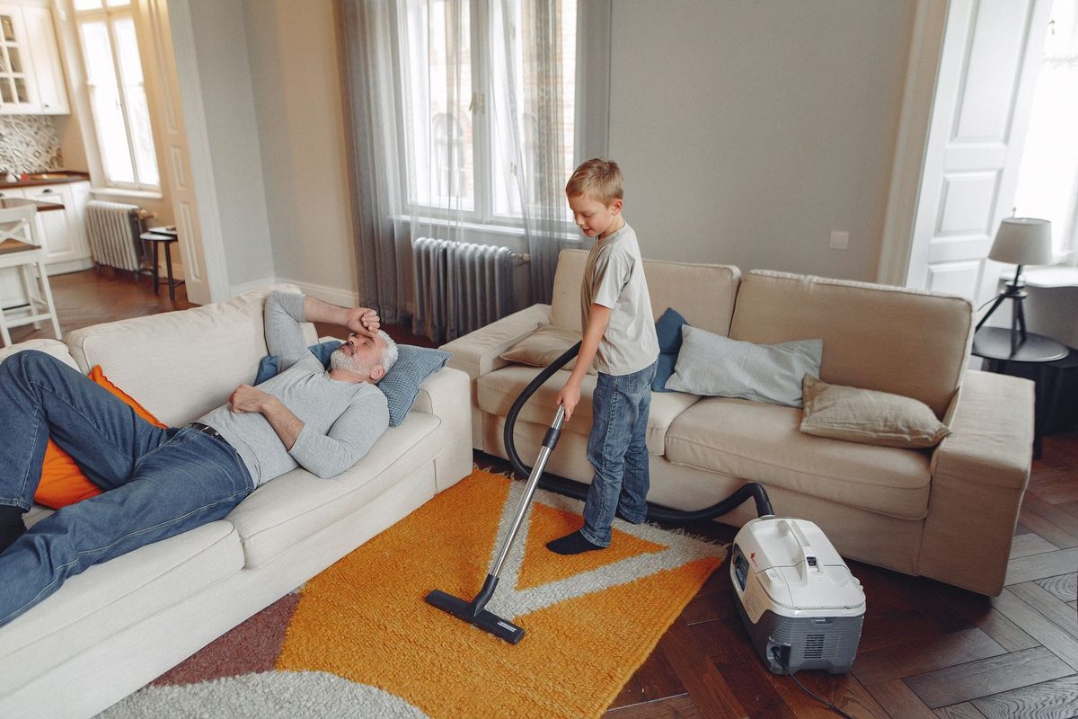A home being cleaned while the family relaxes