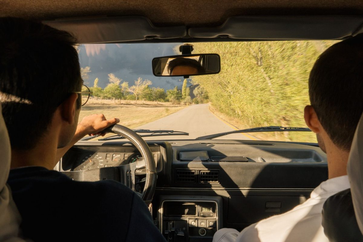 Driving instructor beside a learner during a lesson in the car