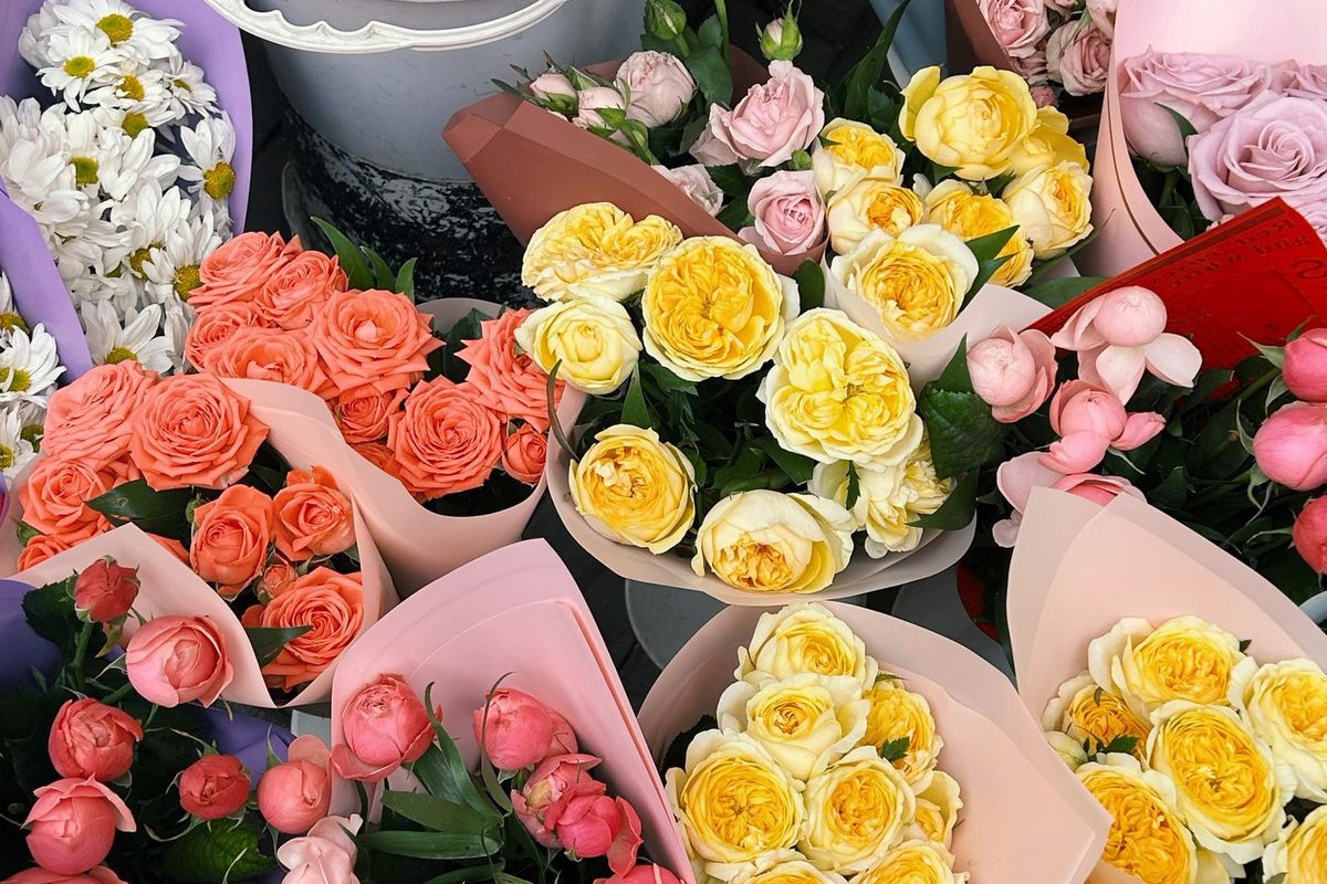 Buckets of colourful bouquets in a flower shop