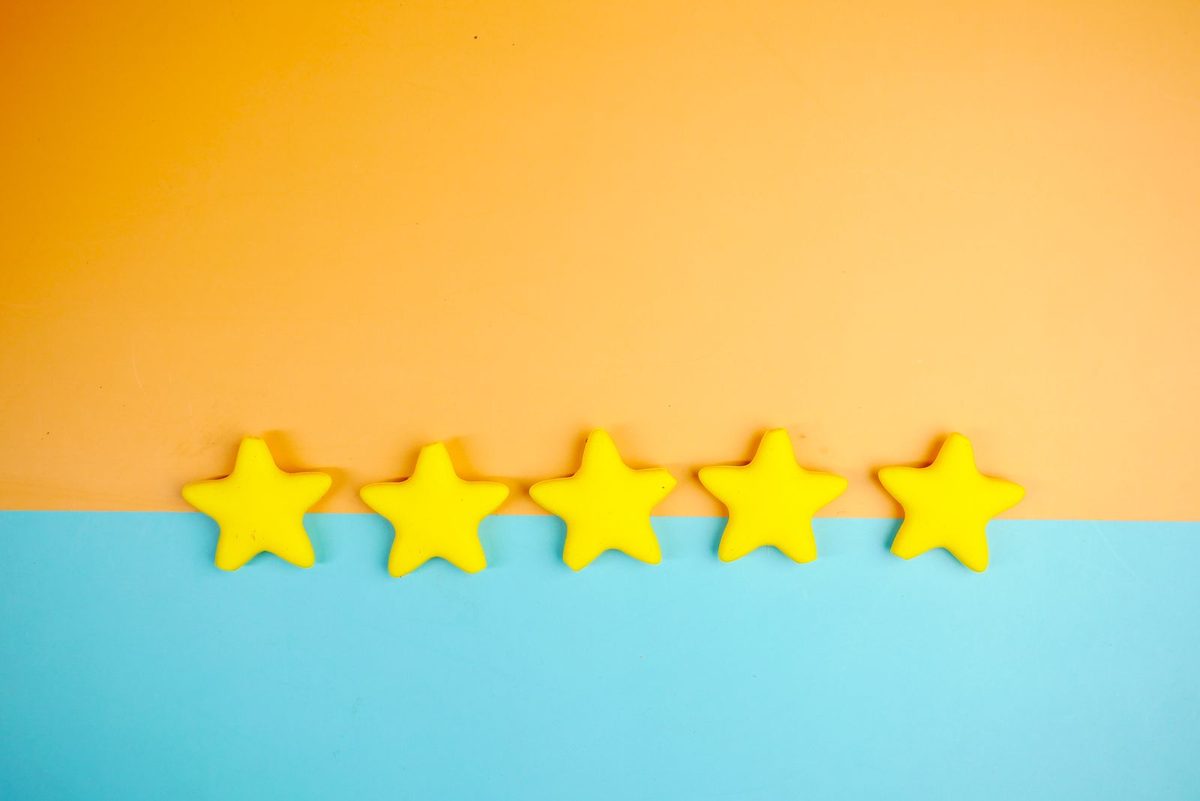 Five gold stars representing a five-star customer review