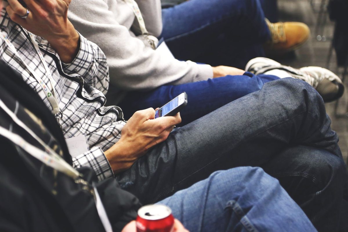 Person checking a local business listing on their phone