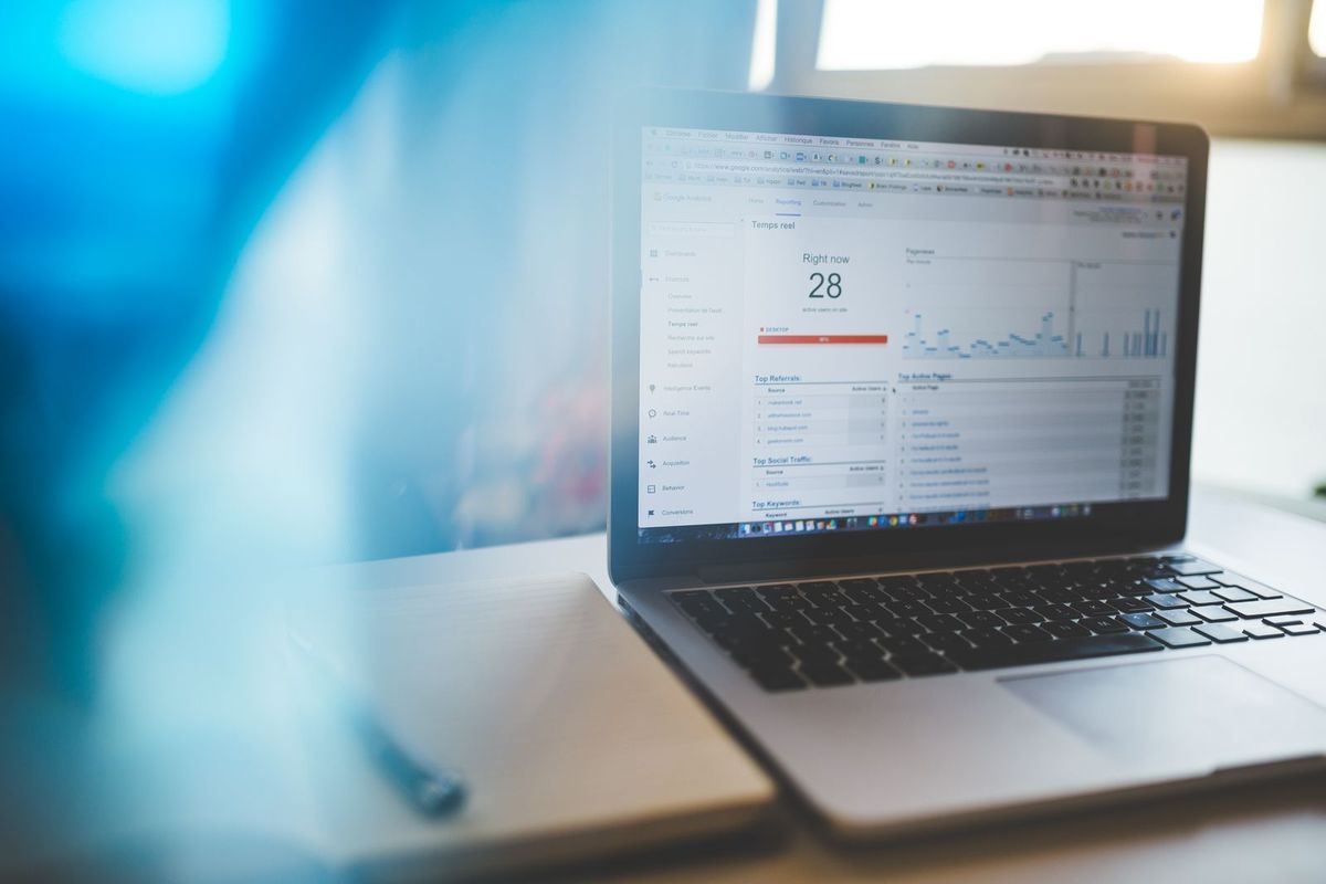 Laptop showing a search performance report with charts