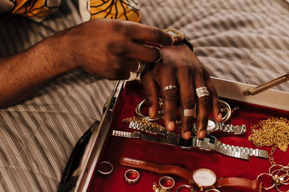 A jeweller carefully working on a piece of jewellery