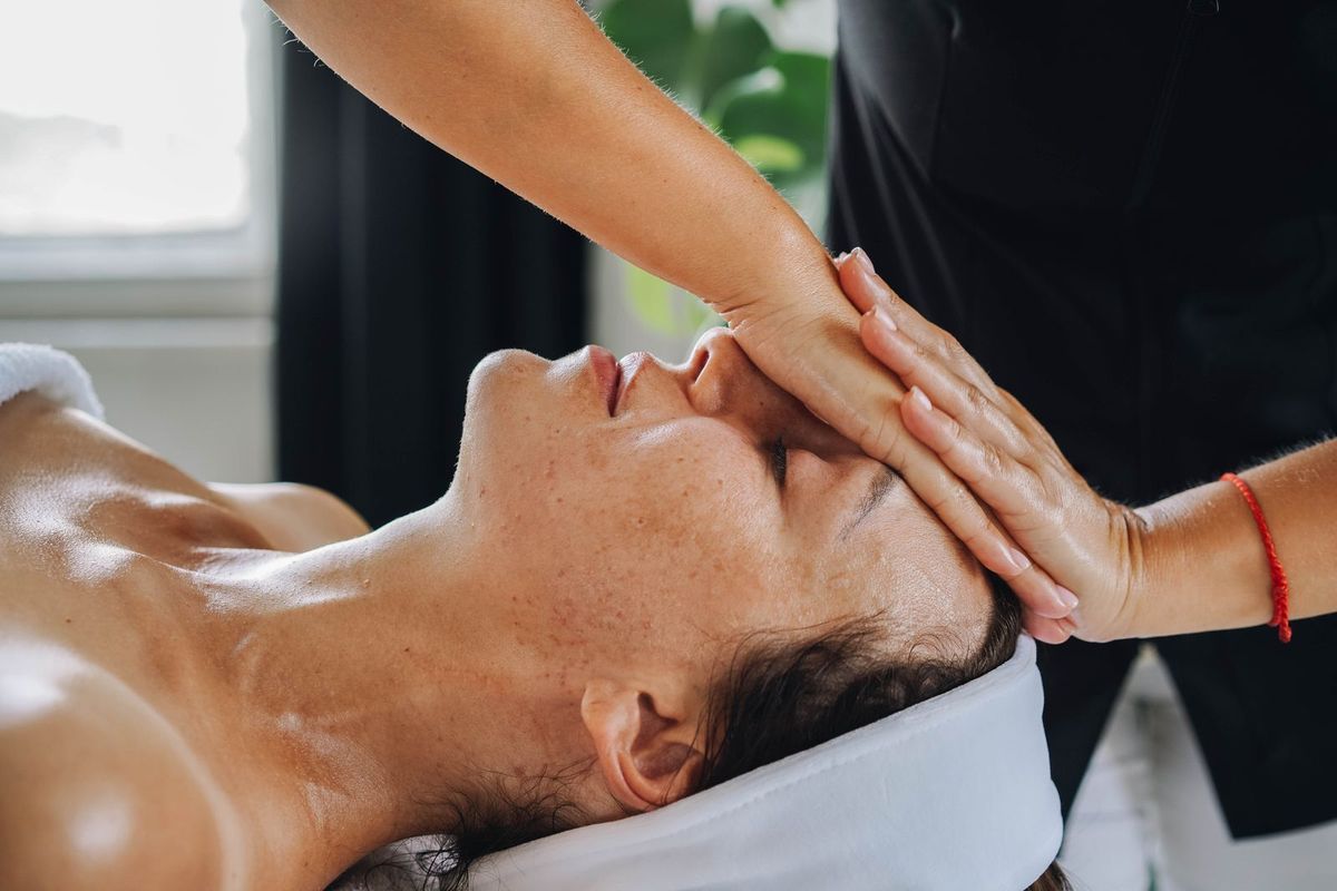 Person relaxing deeply during a soothing spa treatment