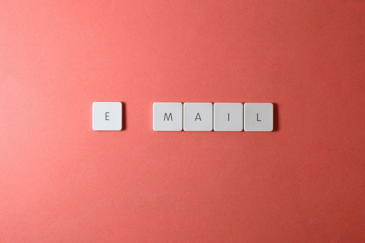 The word email spelled out in letter tiles