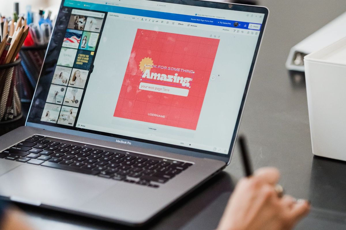 Person rebuilding a website design on a laptop